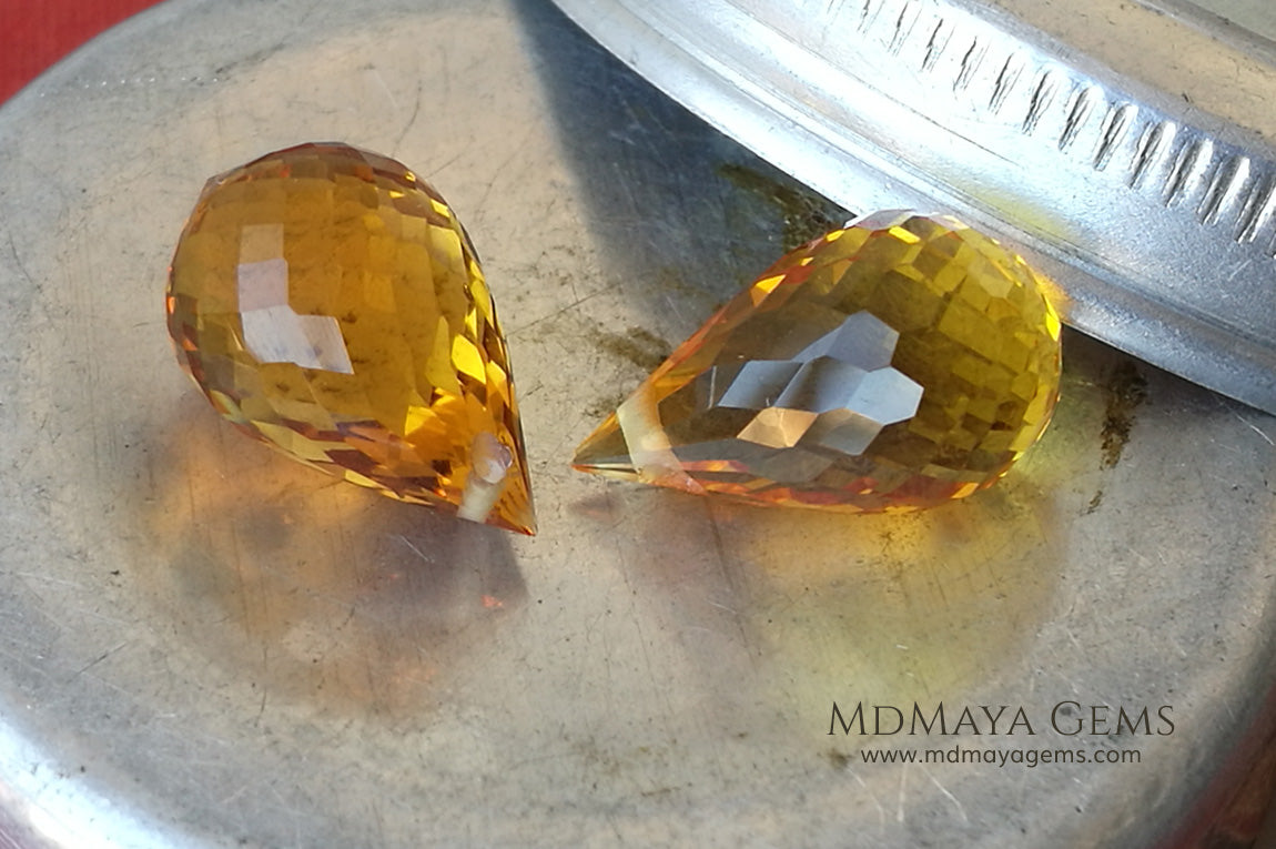 Vibrant orangy yellow citrine pair 9.98 ct