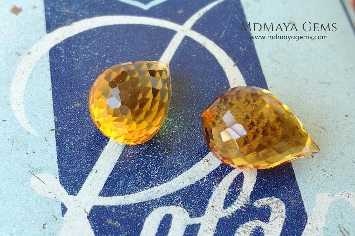 Vibrant orangy yellow citrine pair 9.98 ct