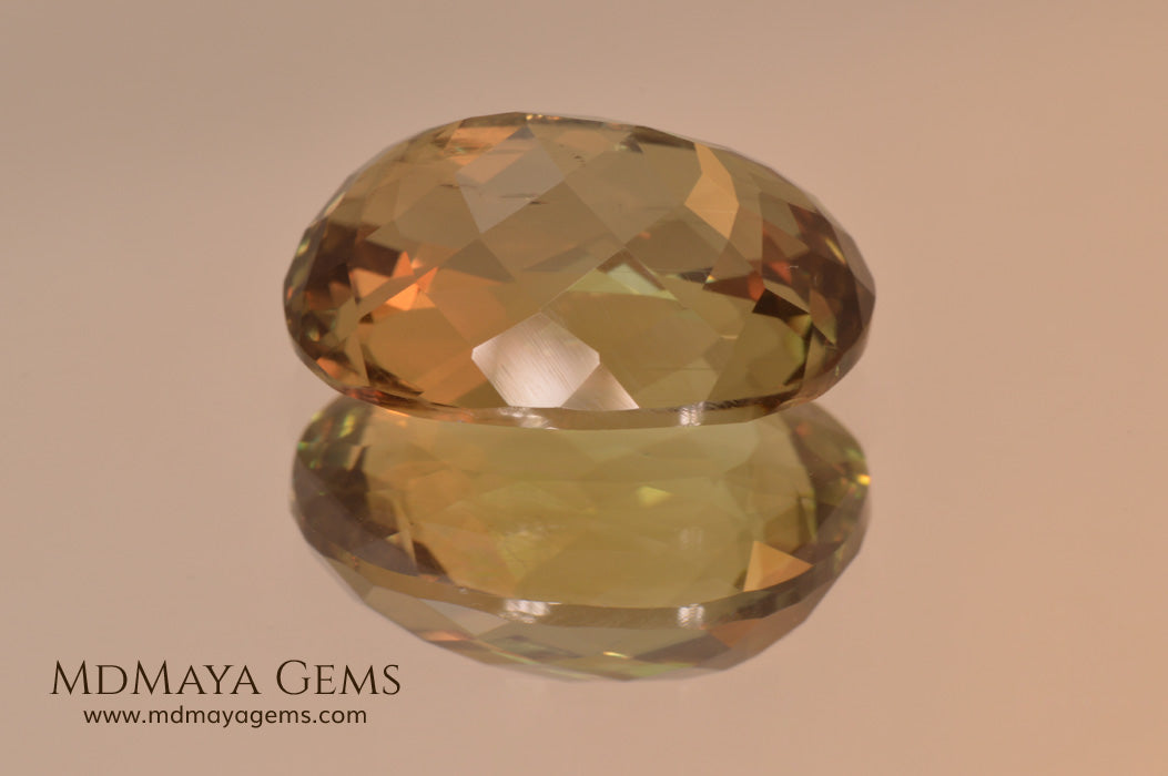 Color Change Diaspore Gemstone 12.03 ct under different lighting conditions