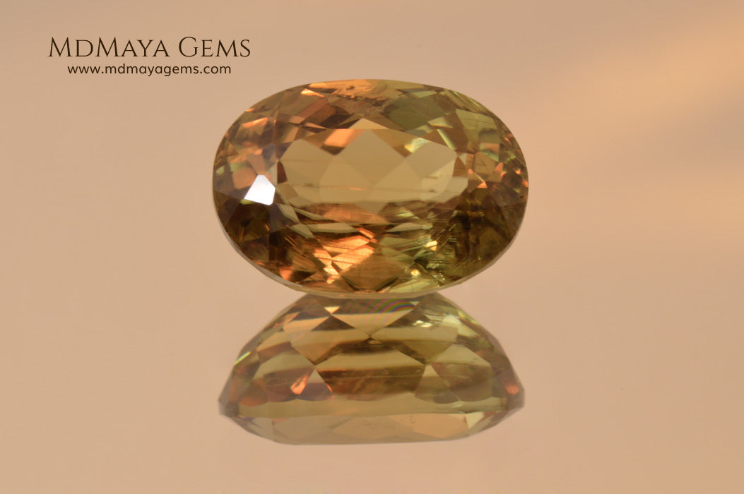 Color Change Diaspore Gemstone 7.68 ct under different lighting conditions