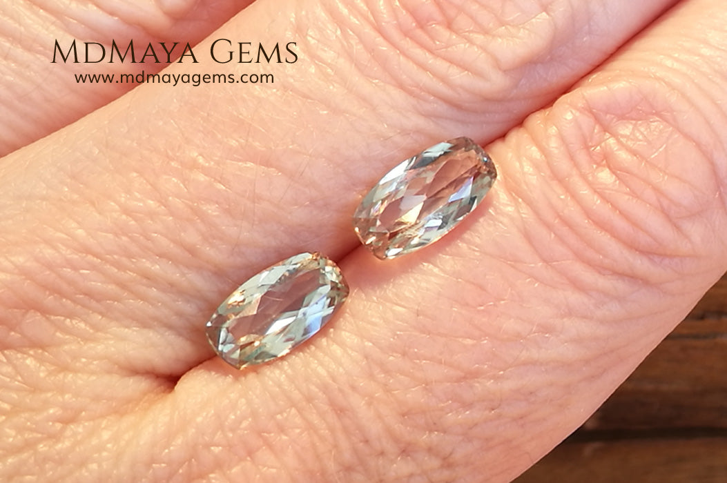 Color Change Diaspore Gemstone 3.15 ct pair under different lighting conditions