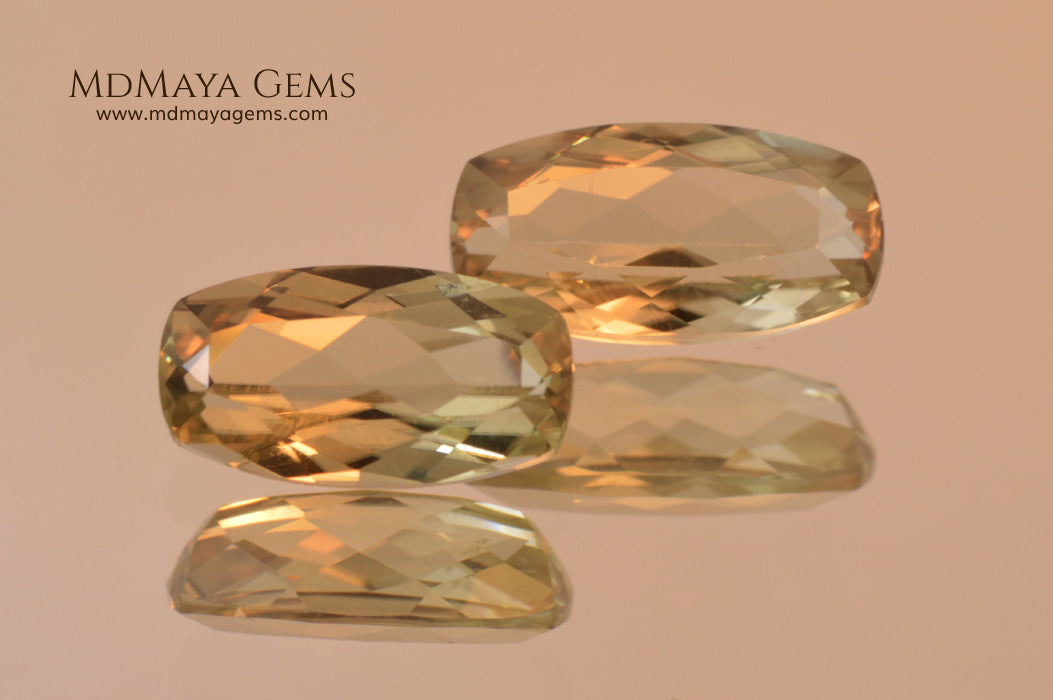 Color Change Diaspore Gemstone 3.15 ct pair under different lighting conditions