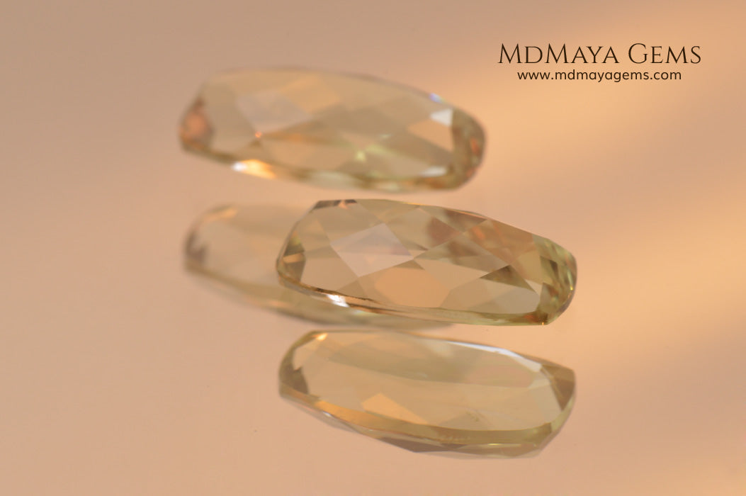 Color Change Diaspore Gemstone 3.15 ct pair under different lighting conditions