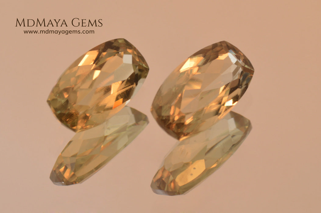 Color Change Diaspore Gemstone 3.15 ct pair under different lighting conditions