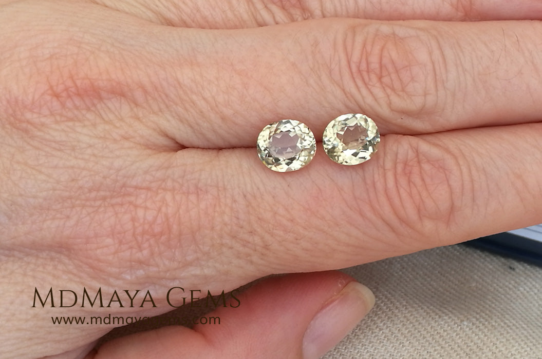 Color Change Diaspore Gemstone 3.99 ct pair under different lighting conditions