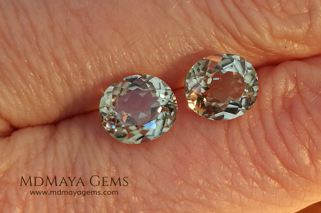 Color Change Diaspore Gemstone 3.99 ct pair under different lighting conditions
