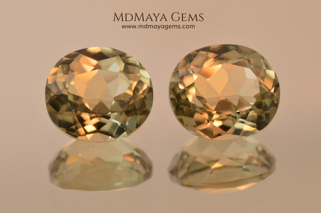 Color Change Diaspore Gemstone 3.99 ct pair under different lighting conditions