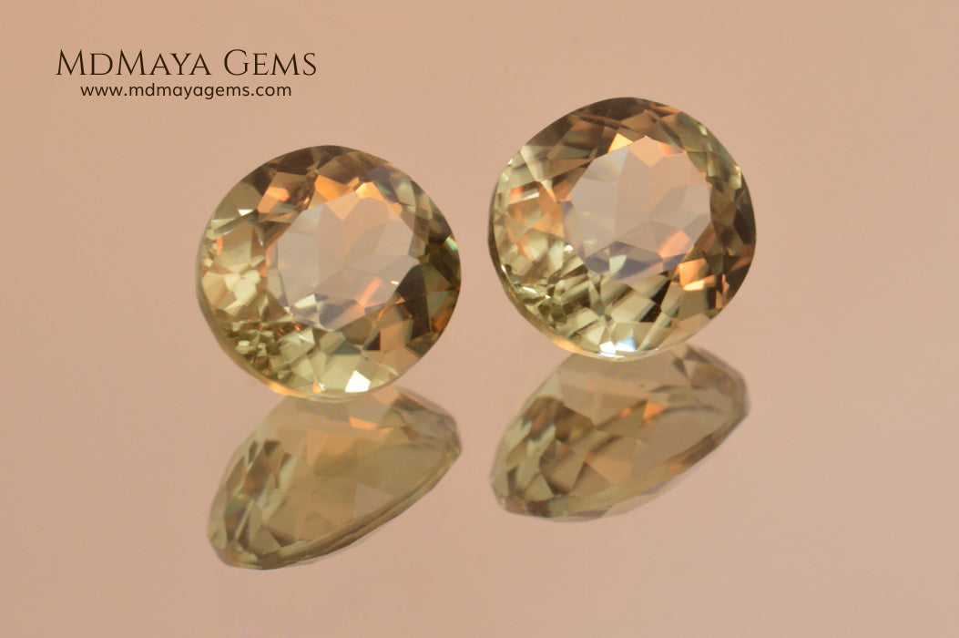 Color Change Diaspore Gemstone 3.99 ct pair under different lighting conditions
