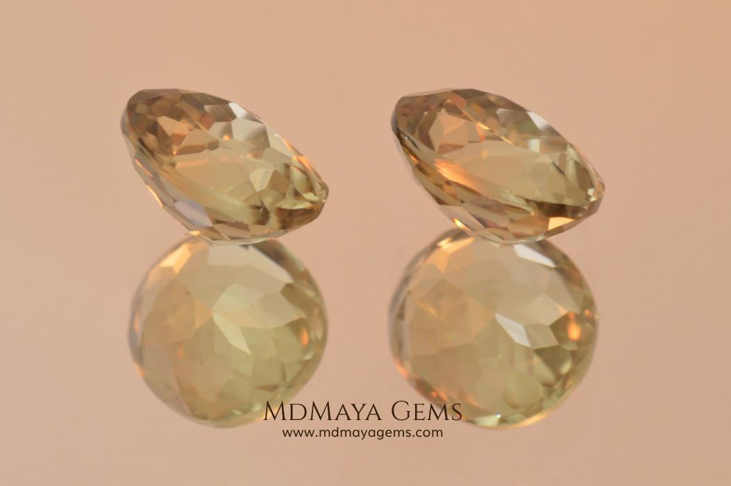 Color Change Diaspore Gemstone 3.99 ct pair under different lighting conditions