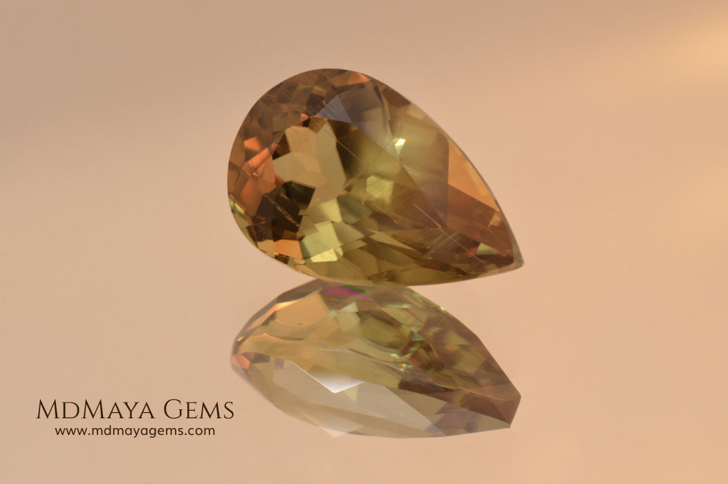 Color Change Diaspore Gemstone 7.77 ct under different lighting conditions