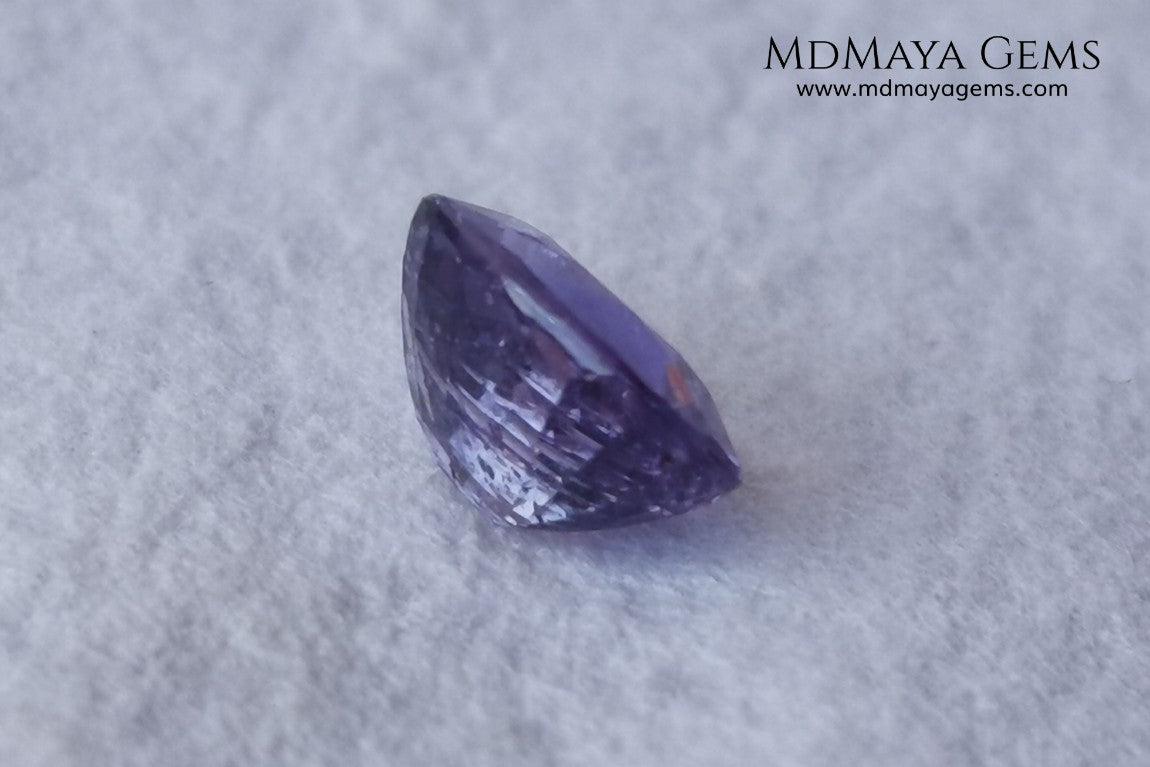  Change Color Sapphire, Oval Cut 1.38 ct. This amazing gemstone is violet in daylight and purple under incandescent light. Its color is very bright and vivid, it will look very interesting in any piece of jewelry, and the best, the price.