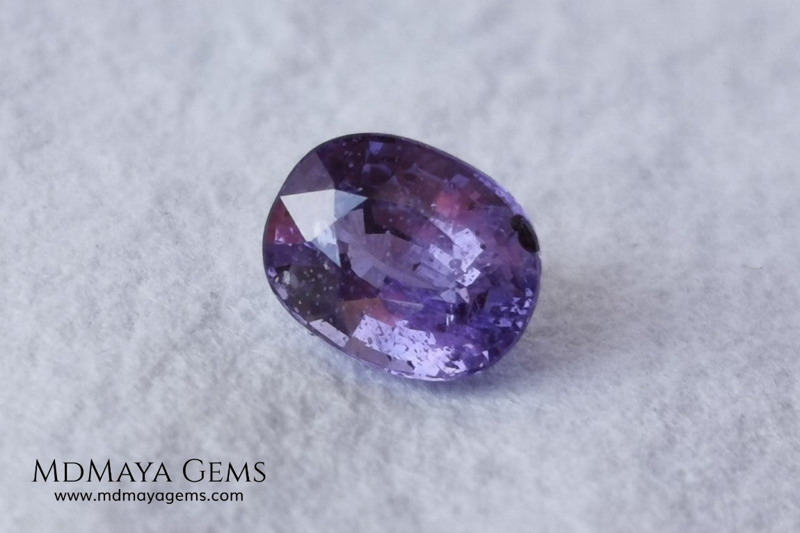  Change Color Sapphire, Oval Cut 1.38 ct. This amazing gemstone is violet in daylight and purple under incandescent light. Its color is very bright and vivid, it will look very interesting in any piece of jewelry, and the best, the price.