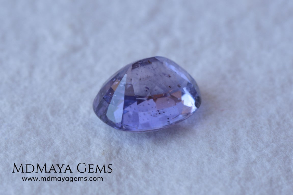  Change Color Sapphire, Oval Cut 1.38 ct. This amazing gemstone is violet in daylight and purple under incandescent light. Its color is very bright and vivid, it will look very interesting in any piece of jewelry, and the best, the price.