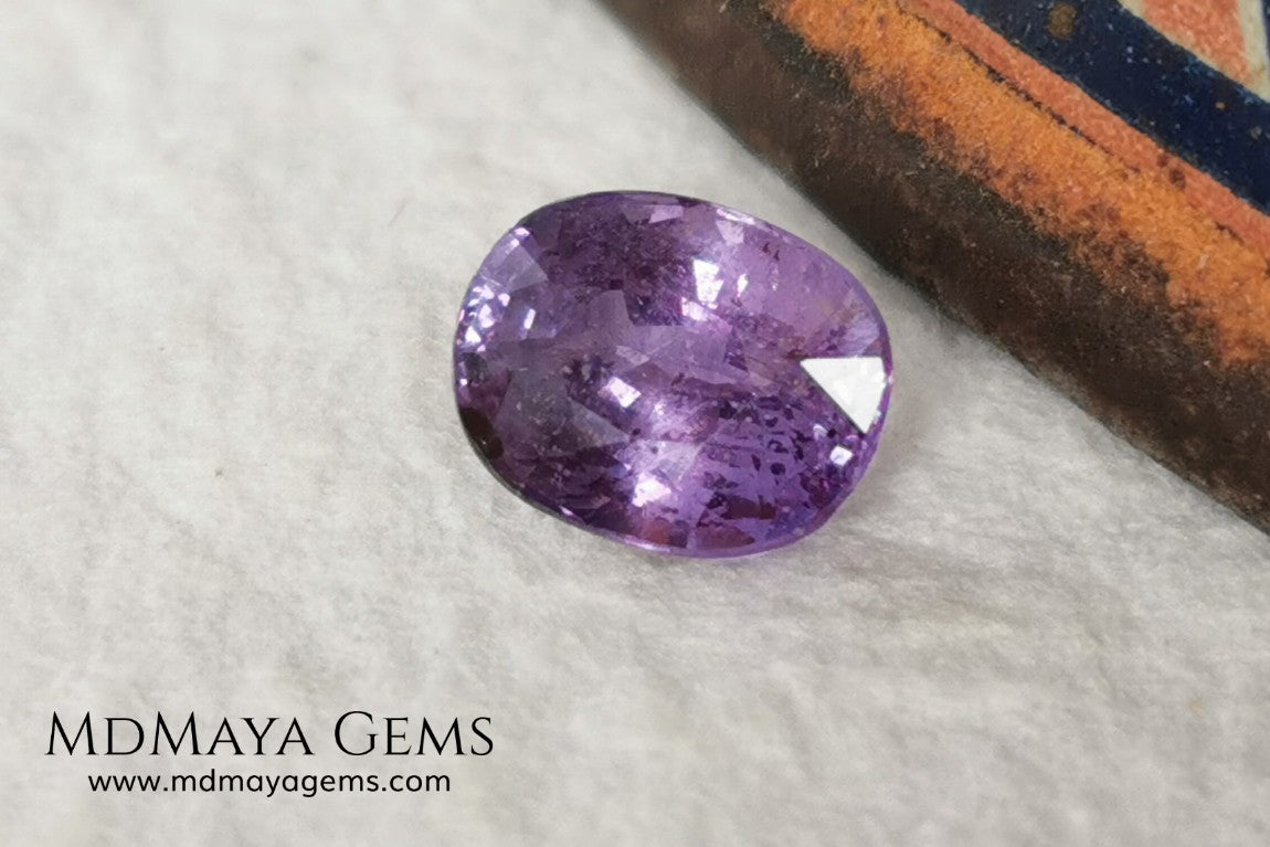  Change Color Sapphire, Oval Cut 1.38 ct. This amazing gemstone is violet in daylight and purple under incandescent light. Its color is very bright and vivid, it will look very interesting in any piece of jewelry, and the best, the price.