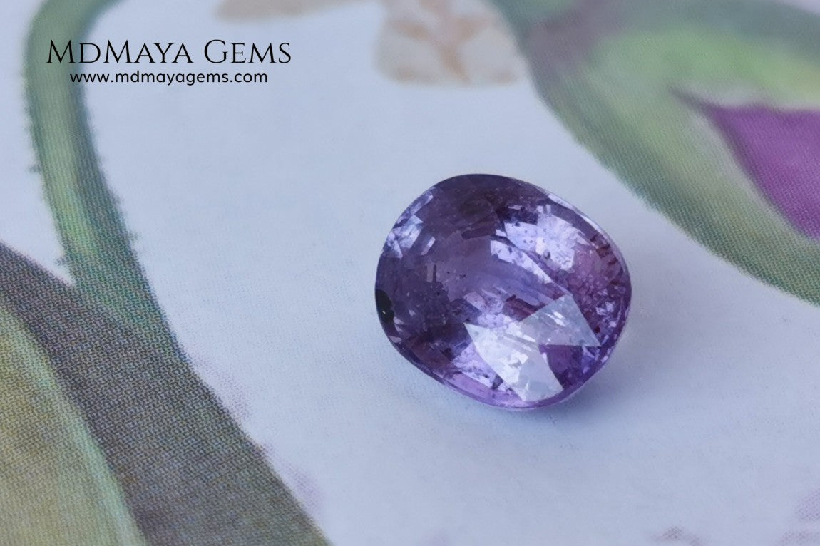  Change Color Sapphire, Oval Cut 1.38 ct. This amazing gemstone is violet in daylight and purple under incandescent light. Its color is very bright and vivid, it will look very interesting in any piece of jewelry, and the best, the price.