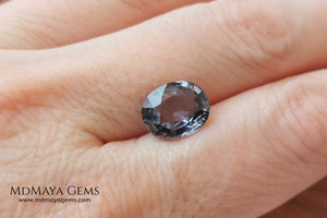 Unheated Color Change Sapphire 4.03 ct. Oval Cut. This untreated gemstone is violetish blue in daylight and purple in incandescent light. A large gem at an affordable price. The gem has a nick on the girdle (not visible with the nacked eye), it will look perfect mounted in any piece of jewelry. Don't miss it! 