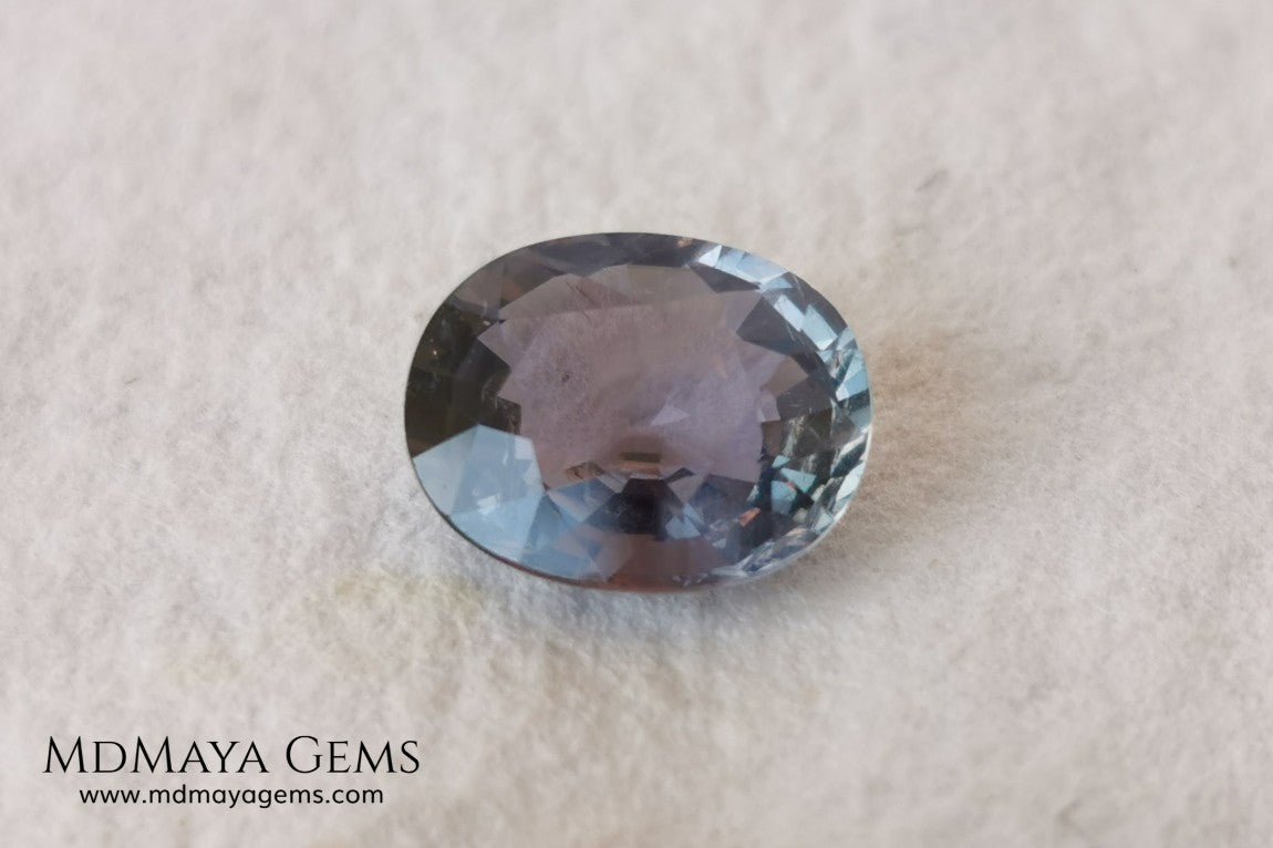 Unheated Color Change Sapphire 4.03 ct. Oval Cut. This untreated gemstone is violetish blue in daylight and purple in incandescent light. A large gem at an affordable price. The gem has a nick on the girdle (not visible with the nacked eye), it will look perfect mounted in any piece of jewelry. Don't miss it! 
