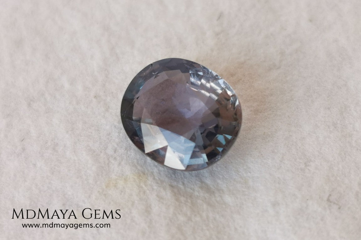 Unheated Color Change Sapphire 4.03 ct. Oval Cut. This untreated gemstone is violetish blue in daylight and purple in incandescent light. A large gem at an affordable price. The gem has a nick on the girdle (not visible with the nacked eye), it will look perfect mounted in any piece of jewelry. Don't miss it! 