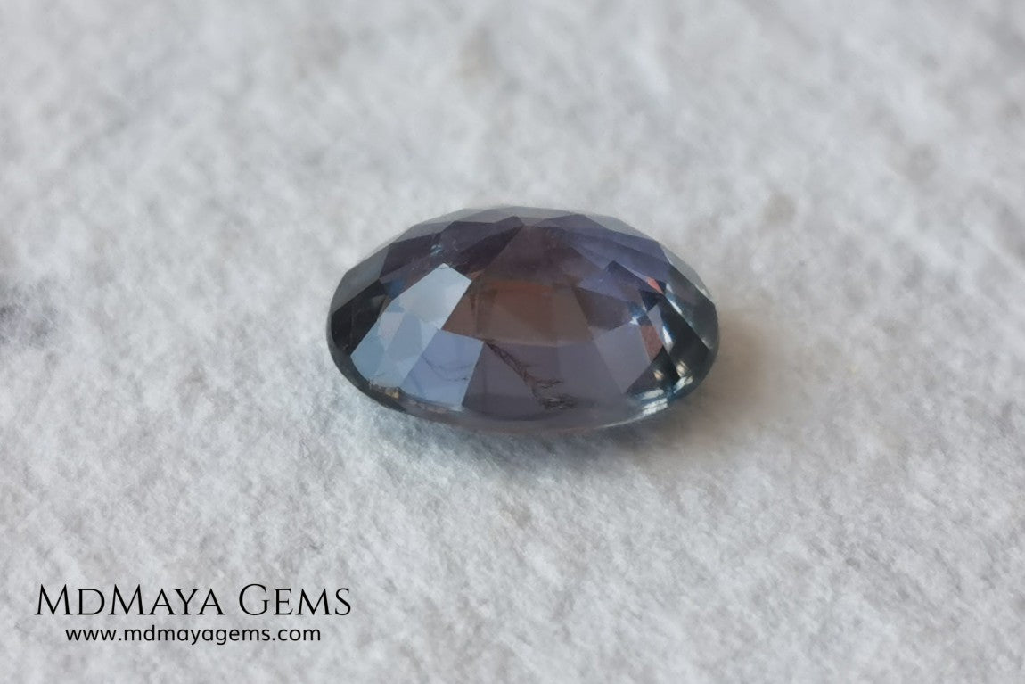 Unheated Color Change Sapphire 4.03 ct. Oval Cut. This untreated gemstone is violetish blue in daylight and purple in incandescent light. A large gem at an affordable price. The gem has a nick on the girdle (not visible with the nacked eye), it will look perfect mounted in any piece of jewelry. Don't miss it! 