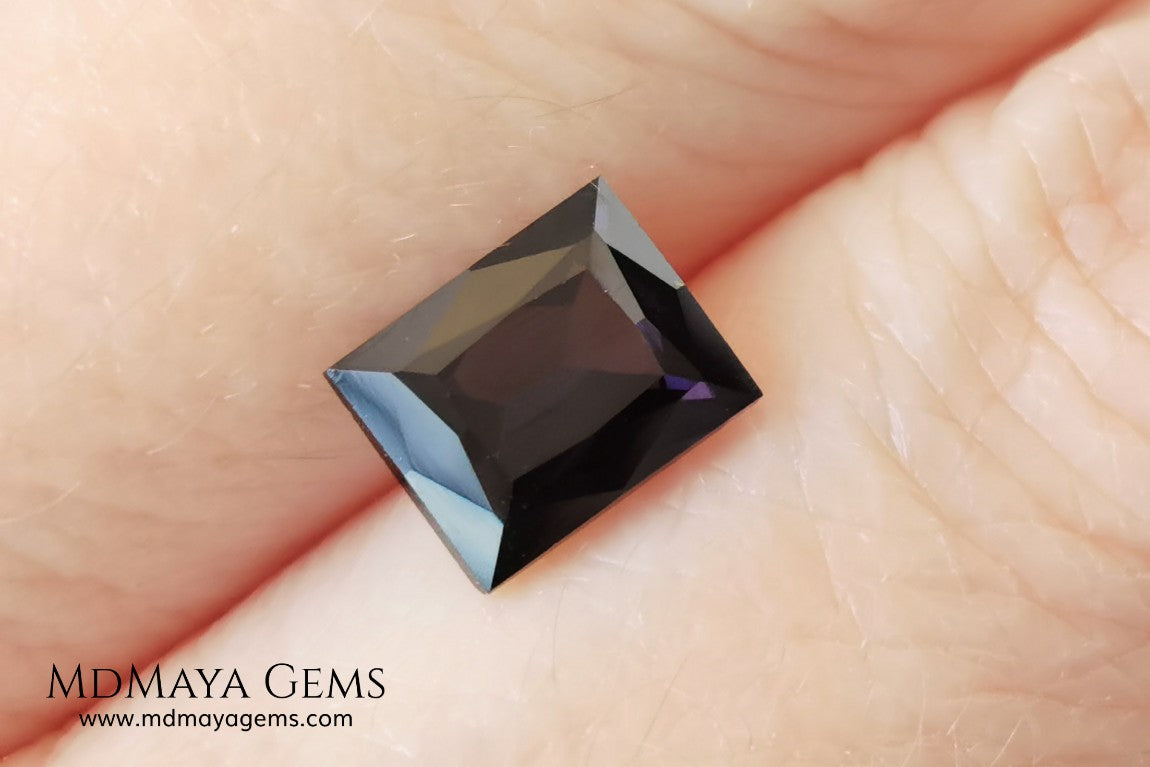  Beautiful Dark Purple Spinel from Sri Lanka. Rectangle cut. 1.80 ct. A natural and untreated gemstone for your personalized jewelry at an affordable price.   Regarding the color, I would like to make a precision, the violet color has a bluish component and the purple has a reddish one. This gem, depending on how the light falls on it, looks purple or violet.