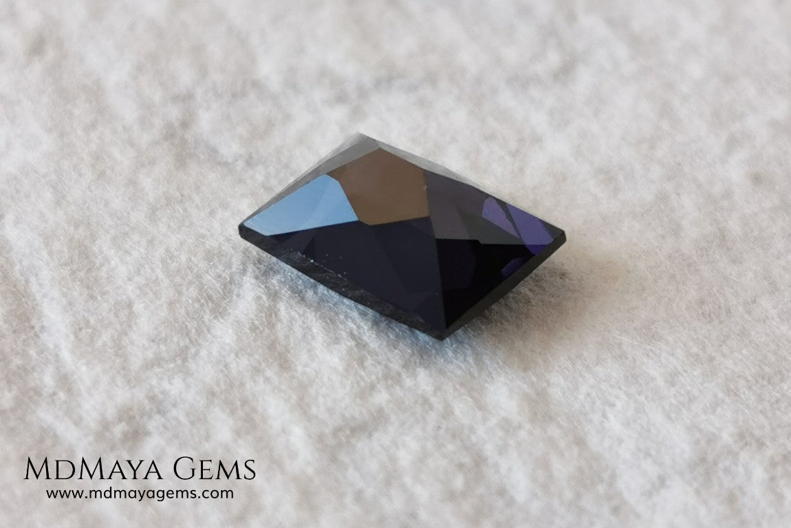  Beautiful Dark Purple Spinel from Sri Lanka. Rectangle cut. 1.80 ct. A natural and untreated gemstone for your personalized jewelry at an affordable price.   Regarding the color, I would like to make a precision, the violet color has a bluish component and the purple has a reddish one. This gem, depending on how the light falls on it, looks purple or violet.