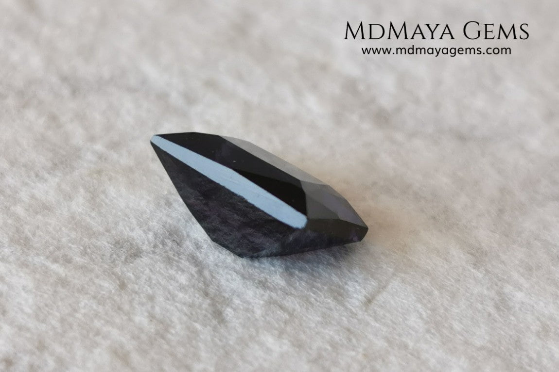  Beautiful Dark Purple Spinel from Sri Lanka. Rectangle cut. 1.80 ct. A natural and untreated gemstone for your personalized jewelry at an affordable price.   Regarding the color, I would like to make a precision, the violet color has a bluish component and the purple has a reddish one. This gem, depending on how the light falls on it, looks purple or violet.