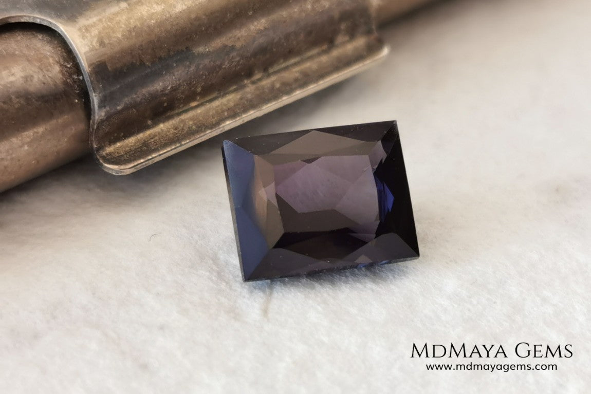  Beautiful Dark Purple Spinel from Sri Lanka. Rectangle cut. 1.80 ct. A natural and untreated gemstone for your personalized jewelry at an affordable price.   Regarding the color, I would like to make a precision, the violet color has a bluish component and the purple has a reddish one. This gem, depending on how the light falls on it, looks purple or violet.