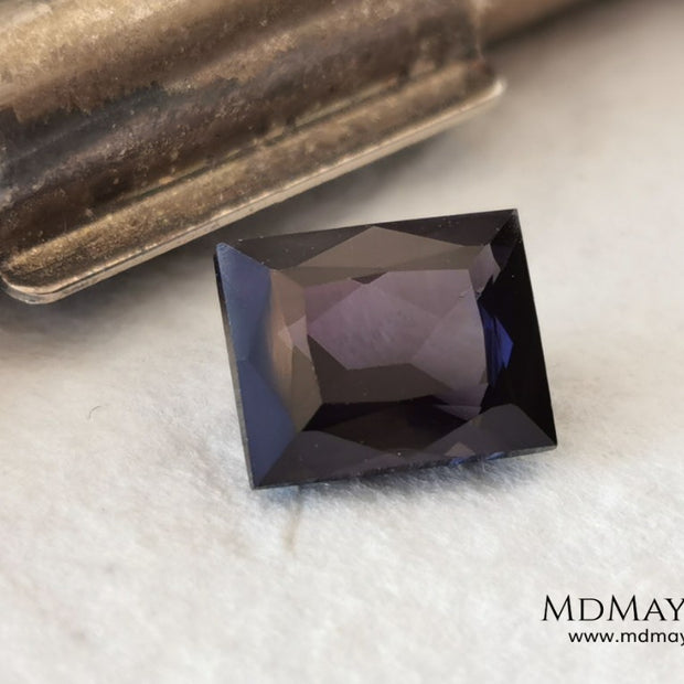  Beautiful Dark Purple Spinel from Sri Lanka. Rectangle cut. 1.80 ct. A natural and untreated gemstone for your personalized jewelry at an affordable price.   Regarding the color, I would like to make a precision, the violet color has a bluish component and the purple has a reddish one. This gem, depending on how the light falls on it, looks purple or violet.