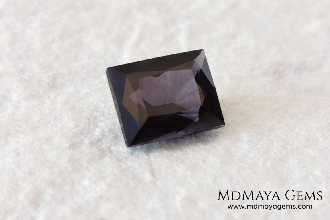  Beautiful Dark Purple Spinel from Sri Lanka. Rectangle cut. 1.80 ct. A natural and untreated gemstone for your personalized jewelry at an affordable price.   Regarding the color, I would like to make a precision, the violet color has a bluish component and the purple has a reddish one. This gem, depending on how the light falls on it, looks purple or violet.