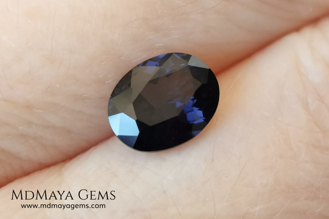Dark Violet Spinel, 2.10 ct, oval cut. This dark gemstone has magnificent behavior under different light, under incandescent light, blue and purple sparkles are seen in it, making it very attractive. If you like different gems, you will like this one. Perfect for your custom jewelry.