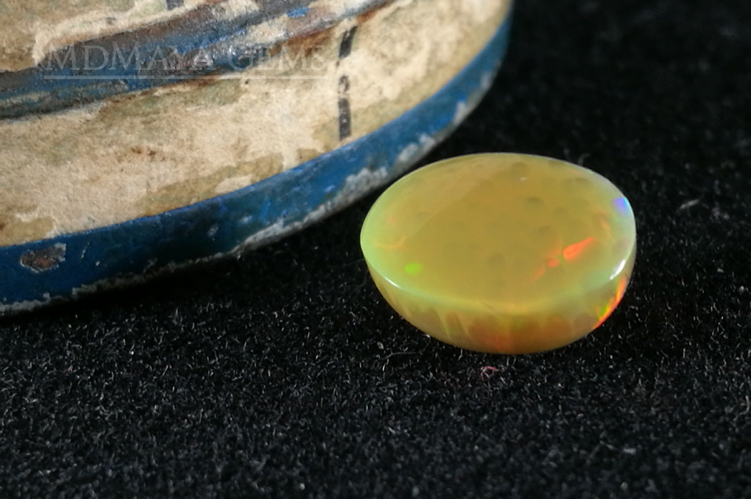 This Welo Opal 1.66  ct shows an interesting honeycomb pattern by one side