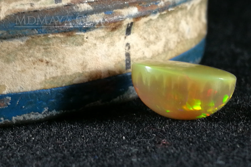 This Welo Opal 1.66  ct shows an interesting honeycomb pattern by one side