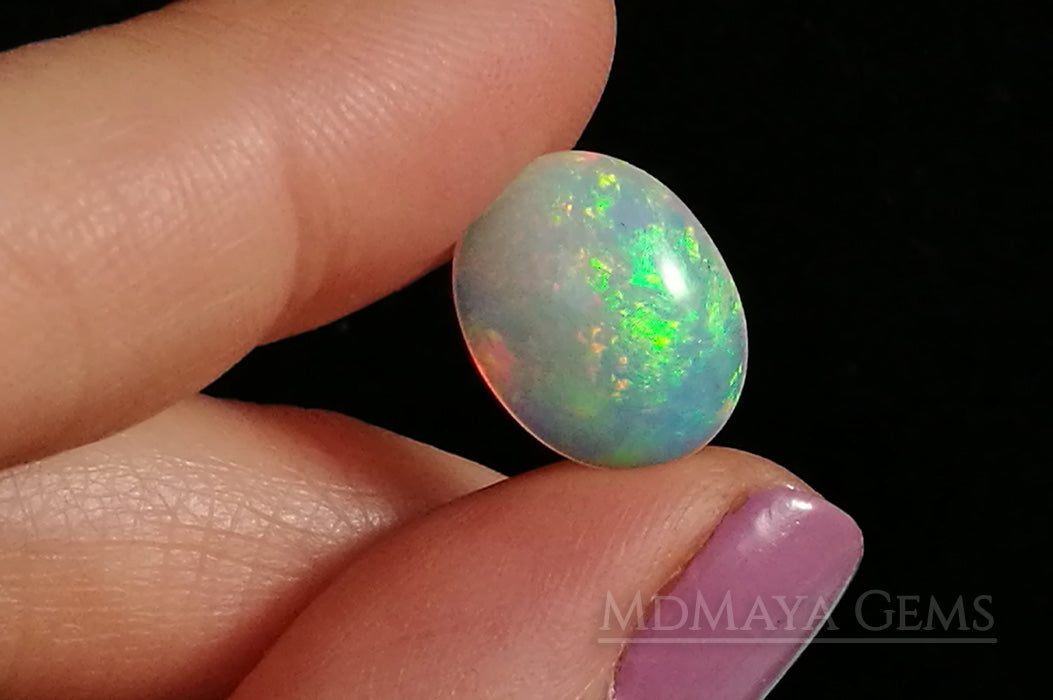 Extremely Bright Ethiopian Opal 3.80 ct with firework pattern