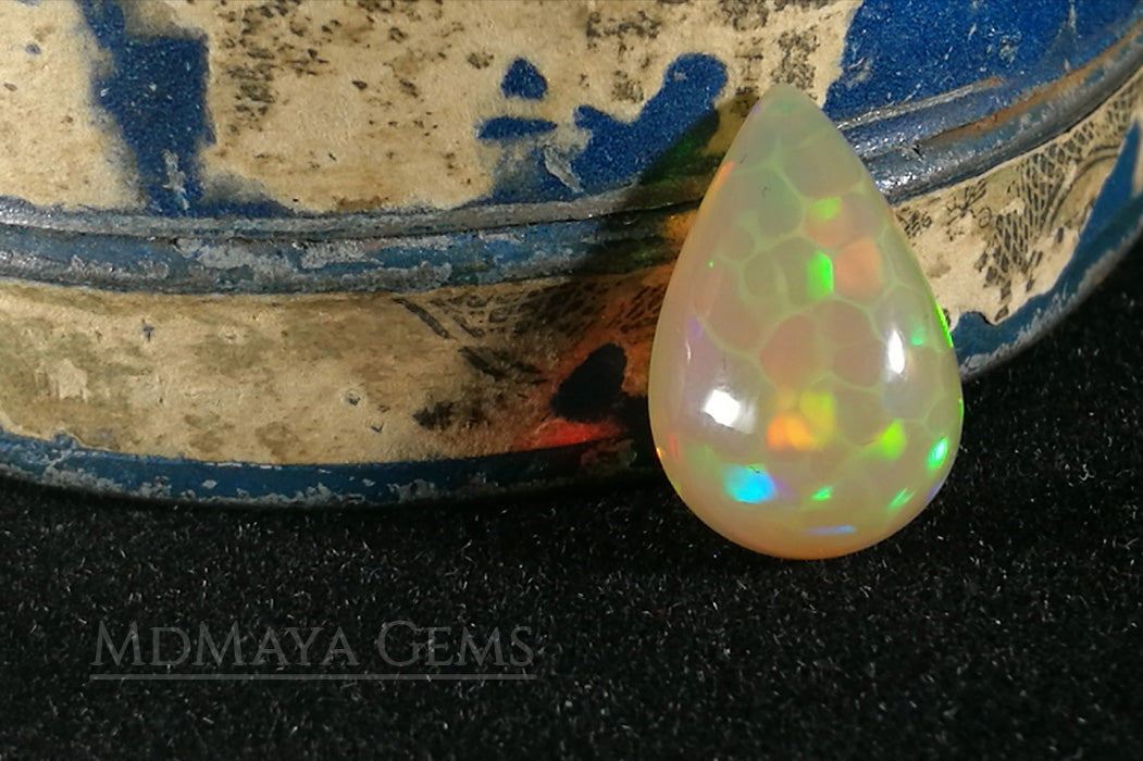 Super HoneyComb Opal from Ethiopia 4.47 ct. Pear Cabochon Cut