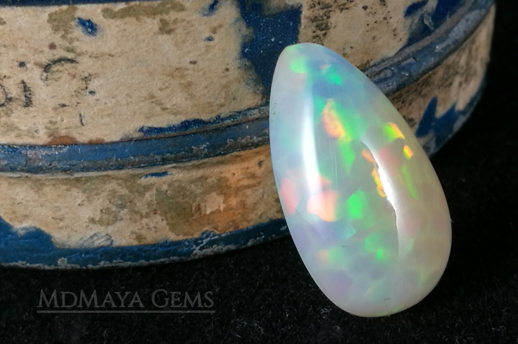 Welo Opal Gemstone 4.82 ct. Pear Cabochon Cut with honeycomb pattern 