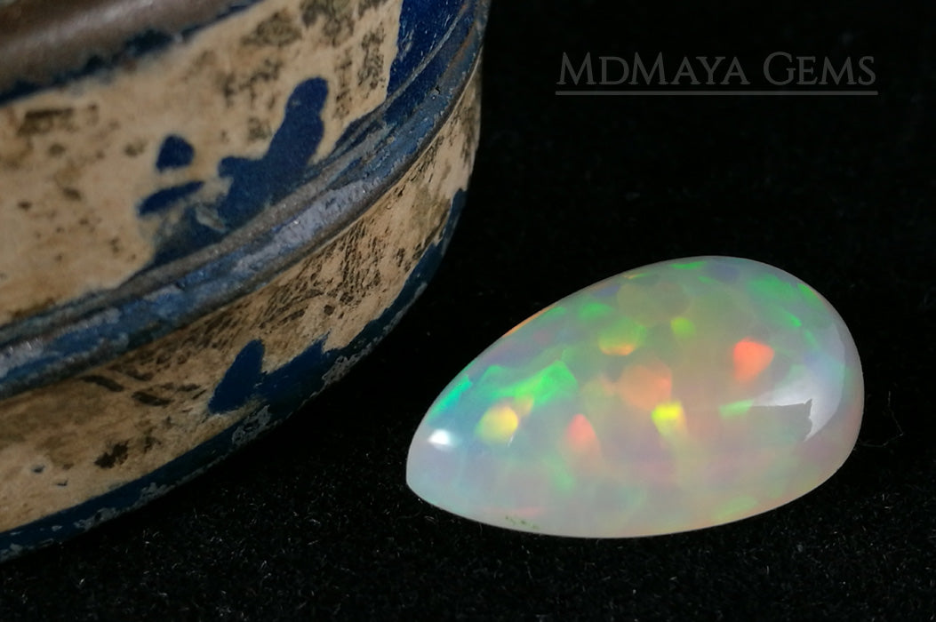 Welo Opal Gemstone 4.82 ct. Pear Cabochon Cut with honeycomb pattern 