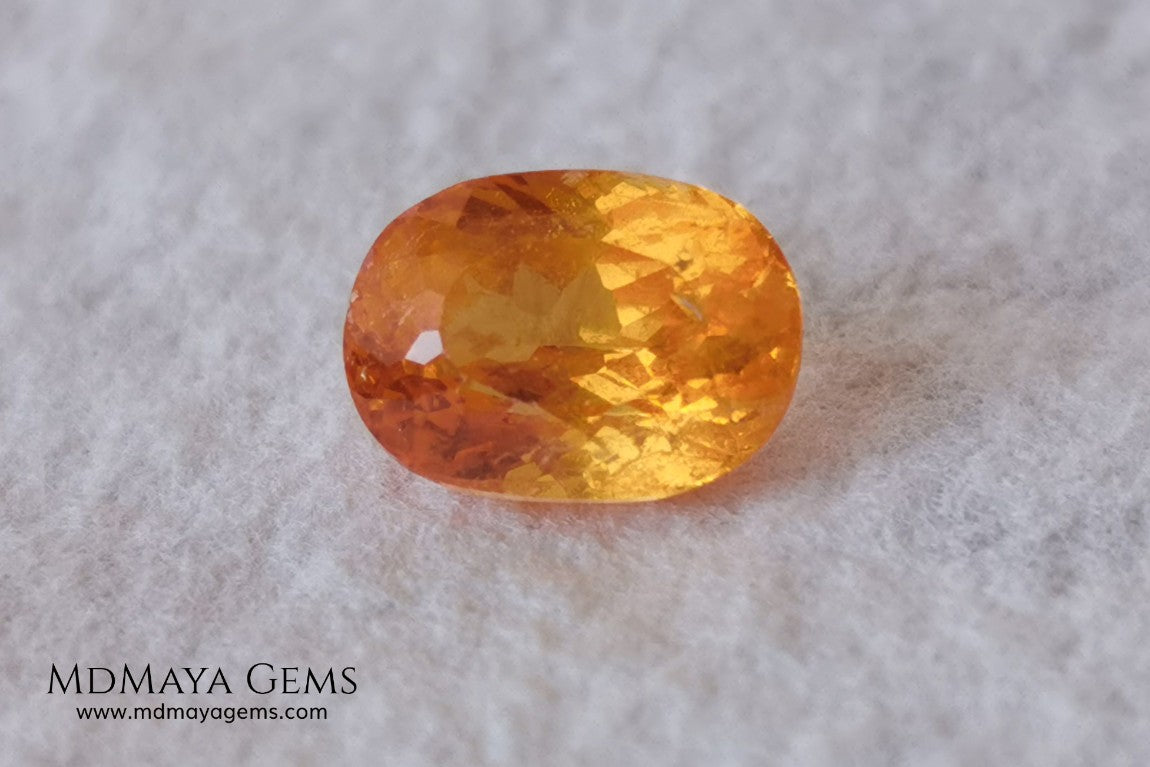  Fanta Unheated Spessartite Garnet. Oval Cut. 2.17 ct. This gemstone has a pure orange, without brown or reddish tones, it is rare for a gem to have such a pure color, and it is simply impressive. It has inclusions that do not affect the beauty of the gem at all. It will be incredibly beautiful mounted on any piece of jewelry, it will be the center of attention.
