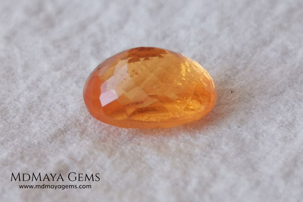  Fanta Unheated Spessartite Garnet. Oval Cut. 2.17 ct. This gemstone has a pure orange, without brown or reddish tones, it is rare for a gem to have such a pure color, and it is simply impressive. It has inclusions that do not affect the beauty of the gem at all. It will be incredibly beautiful mounted on any piece of jewelry, it will be the center of attention.