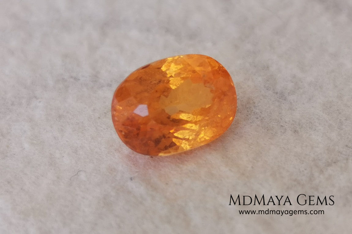  Fanta Unheated Spessartite Garnet. Oval Cut. 2.17 ct. This gemstone has a pure orange, without brown or reddish tones, it is rare for a gem to have such a pure color, and it is simply impressive. It has inclusions that do not affect the beauty of the gem at all. It will be incredibly beautiful mounted on any piece of jewelry, it will be the center of attention.