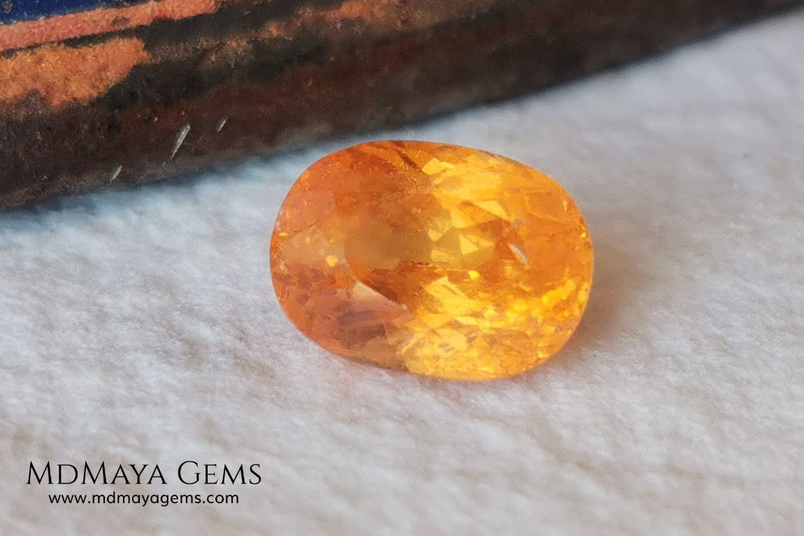  Fanta Unheated Spessartite Garnet. Oval Cut. 2.17 ct. This gemstone has a pure orange, without brown or reddish tones, it is rare for a gem to have such a pure color, and it is simply impressive. It has inclusions that do not affect the beauty of the gem at all. It will be incredibly beautiful mounted on any piece of jewelry, it will be the center of attention.
