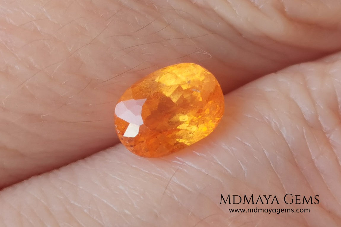  Fanta Unheated Spessartite Garnet. Oval Cut. 2.17 ct. This gemstone has a pure orange, without brown or reddish tones, it is rare for a gem to have such a pure color, and it is simply impressive. It has inclusions that do not affect the beauty of the gem at all. It will be incredibly beautiful mounted on any piece of jewelry, it will be the center of attention.