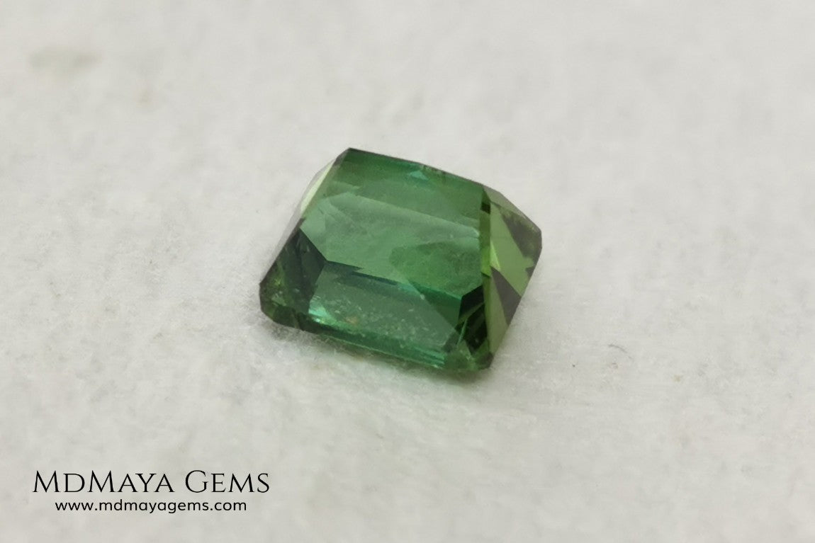 Bright Yellowish Green Tourmaline. 1.26 ct. Rectangular, scissor cut. This beautiful and natural green gemstone shows a vivid and bright color, its behavior under any kind of light is wonderful, always plenty of life and color. It will look perfect in a ring. Low price.