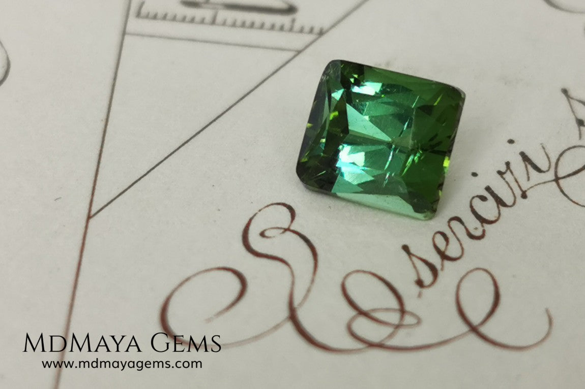 Bright Yellowish Green Tourmaline. 1.26 ct. Rectangular, scissor cut. This beautiful and natural green gemstone shows a vivid and bright color, its behavior under any kind of light is wonderful, always plenty of life and color. It will look perfect in a ring. Low price.