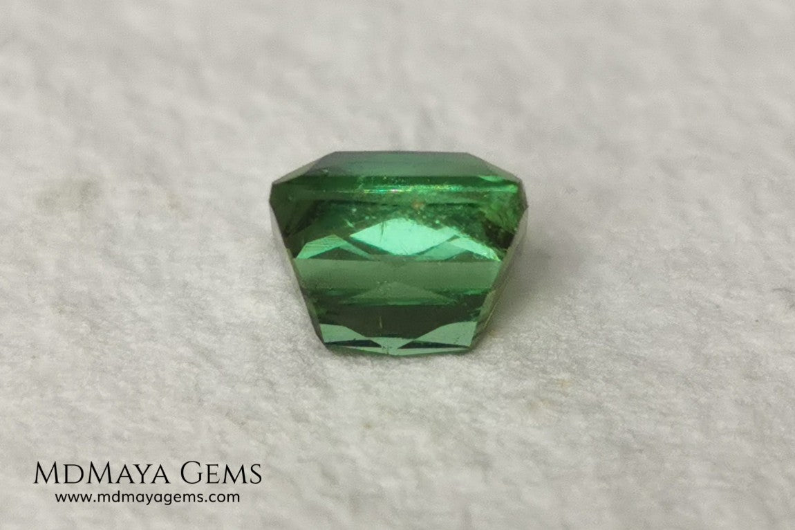 Bright Yellowish Green Tourmaline. 1.26 ct. Rectangular, scissor cut. This beautiful and natural green gemstone shows a vivid and bright color, its behavior under any kind of light is wonderful, always plenty of life and color. It will look perfect in a ring. Low price.
