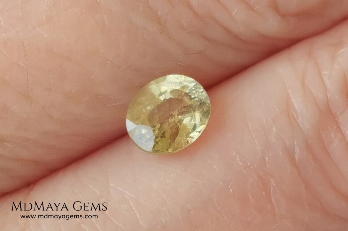  Pale Greenish Yellow Sapphire, Oval Cut. 1.12 ct. Nice unheated gemstone at an affordable price. It will very pretty in any kind of jewelry.