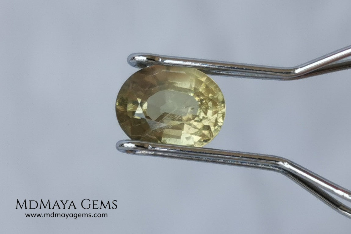  Pale Greenish Yellow Sapphire, Oval Cut. 1.12 ct. Nice unheated gemstone at an affordable price. It will very pretty in any kind of jewelry.