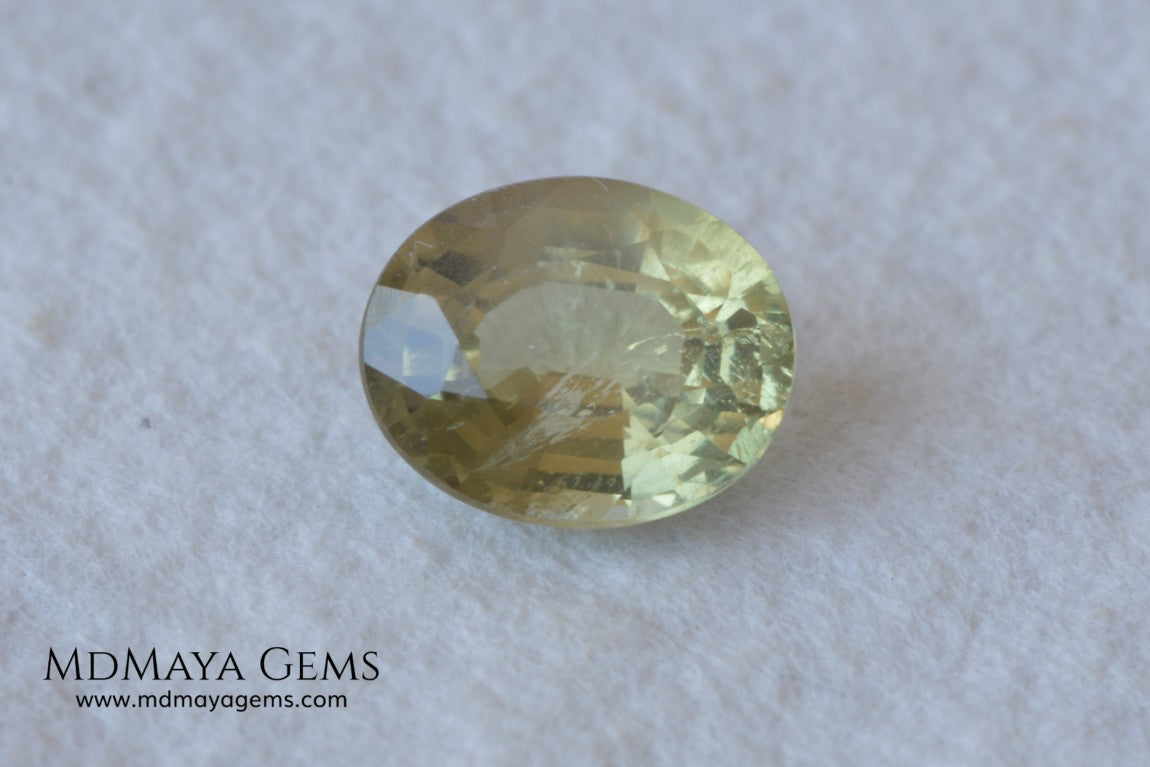  Pale Greenish Yellow Sapphire, Oval Cut. 1.12 ct. Nice unheated gemstone at an affordable price. It will very pretty in any kind of jewelry.