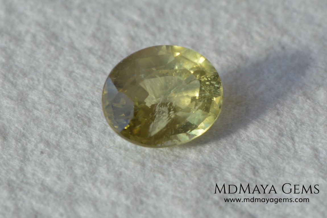  Pale Greenish Yellow Sapphire, Oval Cut. 1.12 ct. Nice unheated gemstone at an affordable price. It will very pretty in any kind of jewelry.