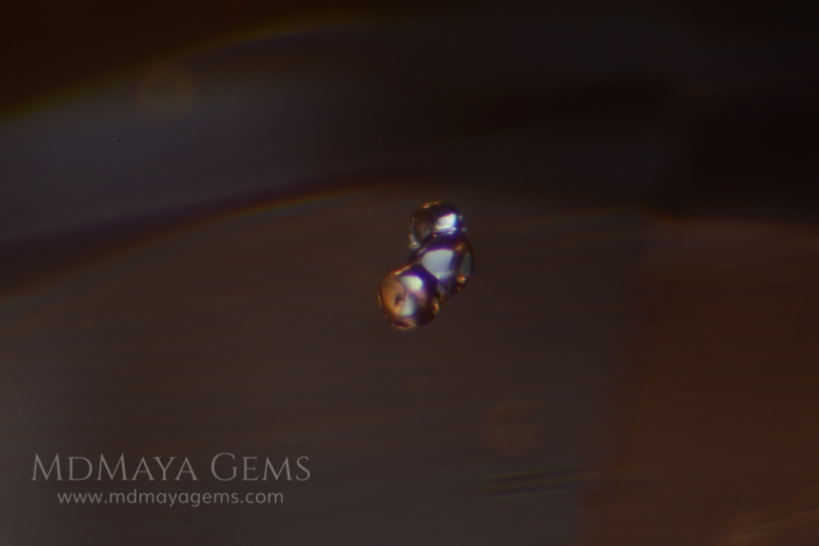 Solid Inclusions in a Grey Spinel 4.07 ct. Cushion Cut