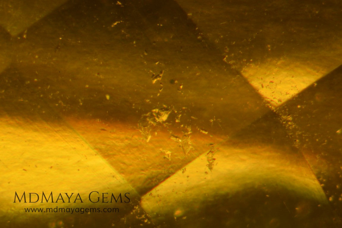 inclusions in idocrase 7.04 ct oval cut